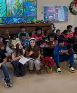 Youth Spread Holiday Cheer with Ugly Sweaters, Carols, and Community Spirit